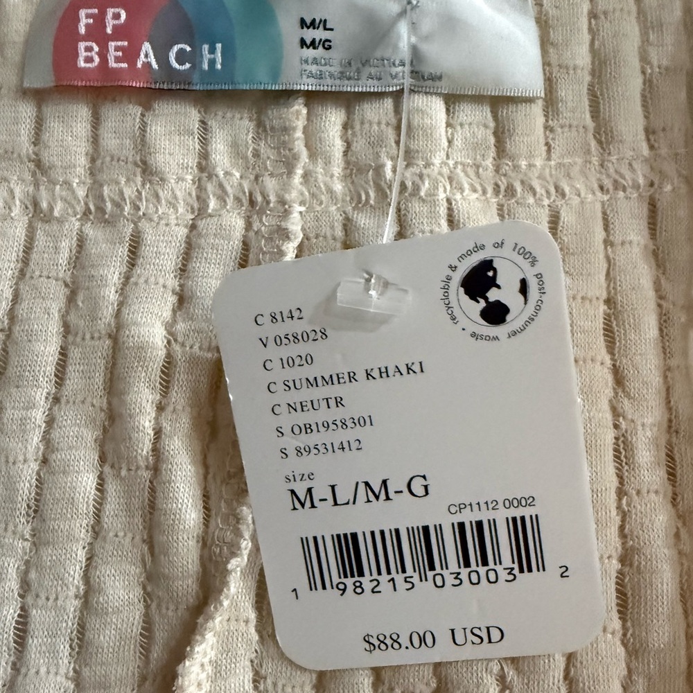 Free People Beach Flora Tunic, a billowy, bohemian-style top. - Picture 7 of 8
